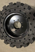 Solid R4 Flat-Free Skid Steer Tire with Pre-Mounted Rim

Close-Up of Heavy-Duty Tread Design on Skid Steer Tire

Flat-Free 12x16.5 R4 Tire for Construction Equipment

10x16.5 R4 Solid Skid Steer Tire with Bolt-On Rim

Skid Steer Tires Ready for Installation