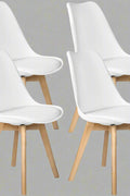 4-Piece White Dining Chair Set – Matte Plastic with Wooden Legs

Modern Kitchen Chairs – Side Angle View

Easy Assembly Dining Chairs with Beech Wood Legs

White Chairs Used in Dining Room Decor

Minimalist Dining Chairs Set for Office or Home