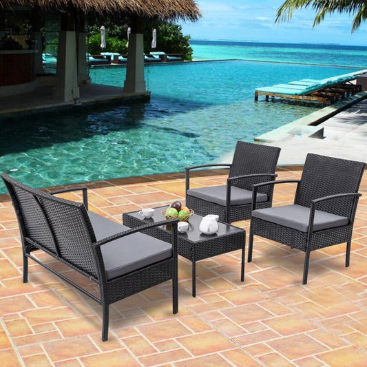 Black rattan outdoor furniture set with loveseat and chairs
4-piece outdoor patio set with glass coffee table on patio
Weather-resistant black PE rattan seating with cushions
Loveseat and two single chairs outdoor set with glass table