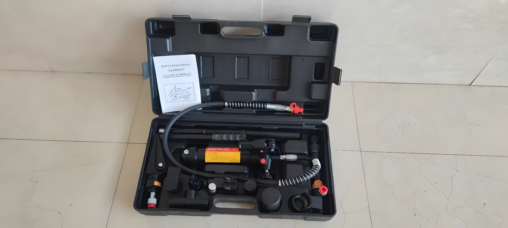 4 Ton Hydraulic Porta Power Kit with attachments and carry case
Auto body frame straightener tool set for car and truck repairs
Heavy-duty hydraulic lift and push tools for garage frame alignment