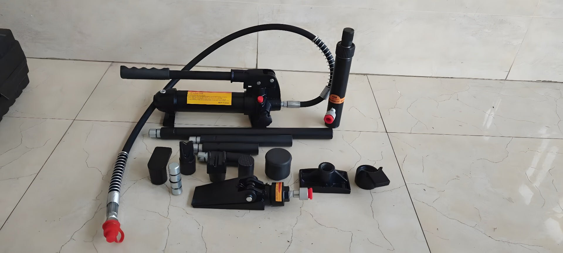 4 Ton Hydraulic Porta Power Kit with attachments and carry case
Auto body frame straightener tool set for car and truck repairs
Heavy-duty hydraulic lift and push tools for garage frame alignment