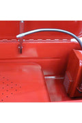 Close-up of solvent hose, filtration system, and basin interior of parts washer