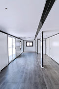 Open kitchen area with cabinets inside the modular container home