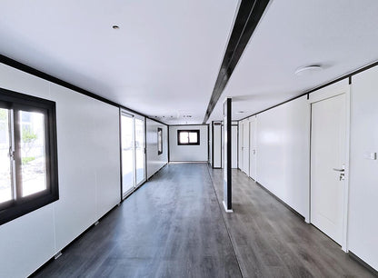 Open kitchen area with cabinets inside the modular container home