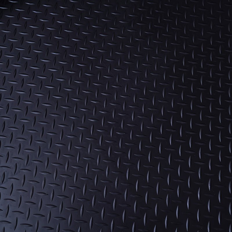 Diamond Rubber Flooring Roll Installed in Garage – Black Non-Slip Surface

Heavy-Duty Rubber Flooring Texture – Diamond Pattern Close-Up

Garage or Gym Flooring Roll – Industrial Rubber Mat

Industrial Rubber Roll Mat – 40 SQFT and 125 SQFT Options Available