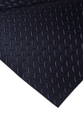 Diamond Rubber Flooring Roll Installed in Garage – Black Non-Slip Surface

Heavy-Duty Rubber Flooring Texture – Diamond Pattern Close-Up

Garage or Gym Flooring Roll – Industrial Rubber Mat

Industrial Rubber Roll Mat – 40 SQFT and 125 SQFT Options Available