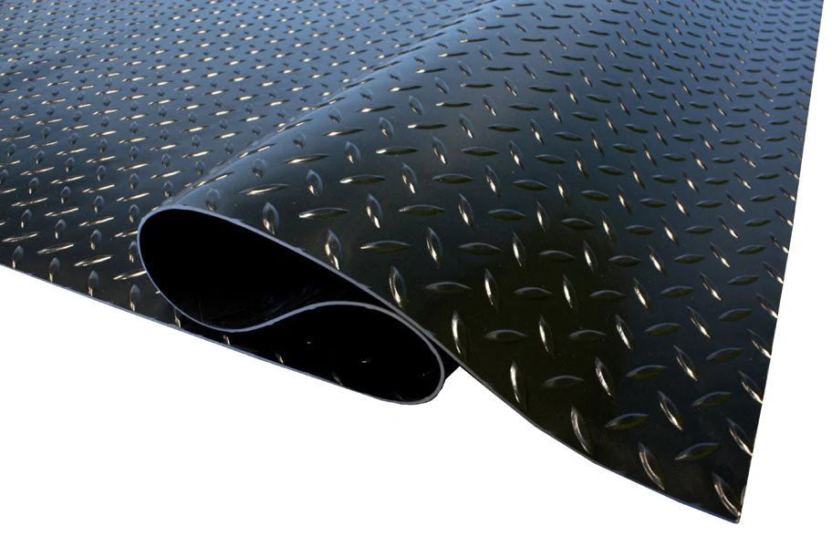 Diamond Rubber Flooring Roll Installed in Garage – Black Non-Slip Surface

Heavy-Duty Rubber Flooring Texture – Diamond Pattern Close-Up

Garage or Gym Flooring Roll – Industrial Rubber Mat

Industrial Rubber Roll Mat – 40 SQFT and 125 SQFT Options Available