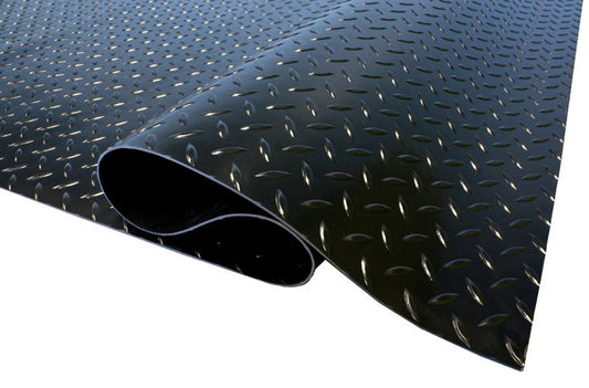 Diamond Rubber Flooring Roll Installed in Garage – Black Non-Slip Surface

Heavy-Duty Rubber Flooring Texture – Diamond Pattern Close-Up

Garage or Gym Flooring Roll – Industrial Rubber Mat

Industrial Rubber Roll Mat – 40 SQFT and 125 SQFT Options Available