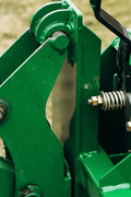 Quick Tach Adapter for John Deere to Skid Steer – 4000 lb
Heavy-duty conversion adapter bracket in green finish
Side view of steel JD quick attach adapter plate
Universal skid steer quick attach converter for tractors 
4000 lb skid steer adapter bracket for JD loaders
