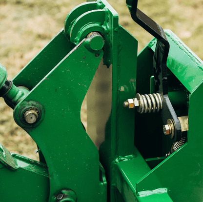 Quick Tach Adapter for John Deere to Skid Steer – 4000 lb
Heavy-duty conversion adapter bracket in green finish
Side view of steel JD quick attach adapter plate
Universal skid steer quick attach converter for tractors 
4000 lb skid steer adapter bracket for JD loaders