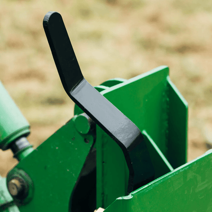 Quick Tach Adapter for John Deere to Skid Steer – 4000 lb
Heavy-duty conversion adapter bracket in green finish
Side view of steel JD quick attach adapter plate
Universal skid steer quick attach converter for tractors 
4000 lb skid steer adapter bracket for JD loaders