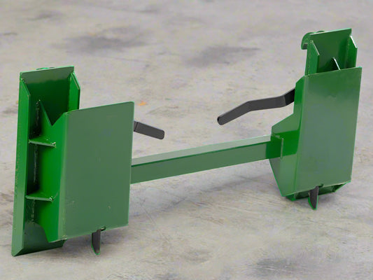 Quick Tach Adapter for John Deere to Skid Steer – 4000 lb
Heavy-duty conversion adapter bracket in green finish
Side view of steel JD quick attach adapter plate
Universal skid steer quick attach converter for tractors 
4000 lb skid steer adapter bracket for JD loaders