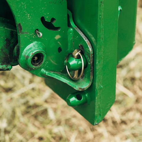 Quick Tach Adapter for John Deere to Skid Steer – 4000 lb
Heavy-duty conversion adapter bracket in green finish
Side view of steel JD quick attach adapter plate
Universal skid steer quick attach converter for tractors 
4000 lb skid steer adapter bracket for JD loaders