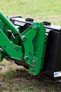Quick Tach Adapter for John Deere to Skid Steer – 4000 lb
Heavy-duty conversion adapter bracket in green finish
Side view of steel JD quick attach adapter plate
Universal skid steer quick attach converter for tractors 
4000 lb skid steer adapter bracket for JD loaders