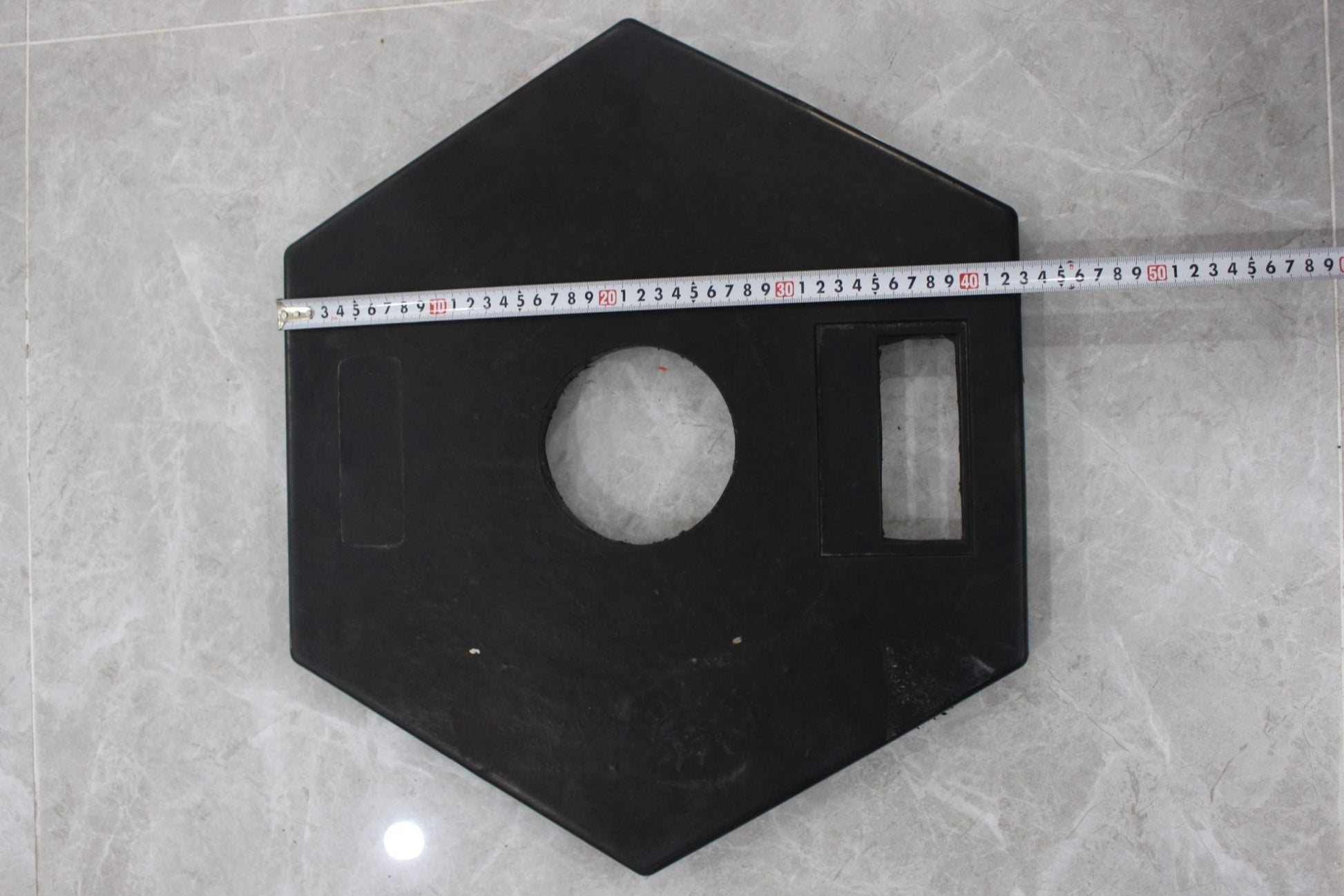 42-inch orange traffic delineator with rubber base
Close-up of reflective bands on safety post
Weighted base for stability on delineator post
Construction zone traffic control delineator
Safety post for pedestrian and event guidance