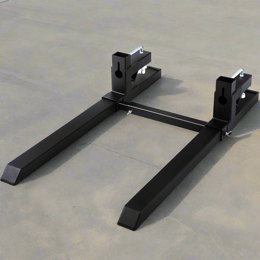 43-inch clamp-on pallet forks with stabilizer bar installed on tractor
Skid steer pallet forks loading hay bales
Adjustable clamp pallet forks for farm and industrial use
Tractor bucket pallet fork attachment with 4,000 lb capacity
Clamp-on pallet forks close-up showing tension screws and bracket