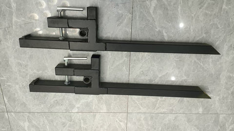 "43 Inch Heavy Duty Clamp On Bucket Forks for Tractor"

"2,000 LB Capacity Pallet Forks for Skid Steer and Tractor"

"Clamp On Fork Attachments for Tractor Buckets"

"Heavy Duty Steel Bucket Forks for Moving Pallets and Logs"