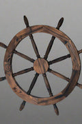 “43 inch rustic wooden ship wheel wall decor”

“Large nautical ship helm wall accent for beach house”

“Vintage coastal wood ship wheel decorative piece”
