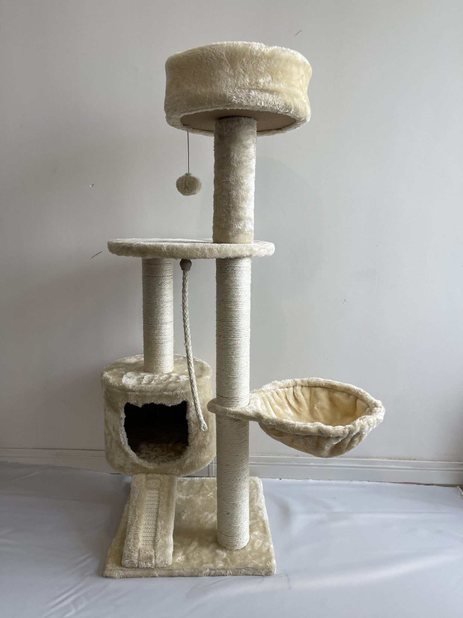 45-inch cream cat tree with scratching posts and condos

Multi-level cat tower with sisal rope posts

Cat furniture with platforms and hideouts