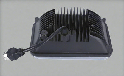 Rear view of 45W 4x6 LED headlight with aluminum heat dissipation fins and 3-prong plug