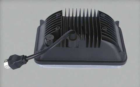 Rear view of 45W 4x6 LED headlight with aluminum heat dissipation fins and 3-prong plug