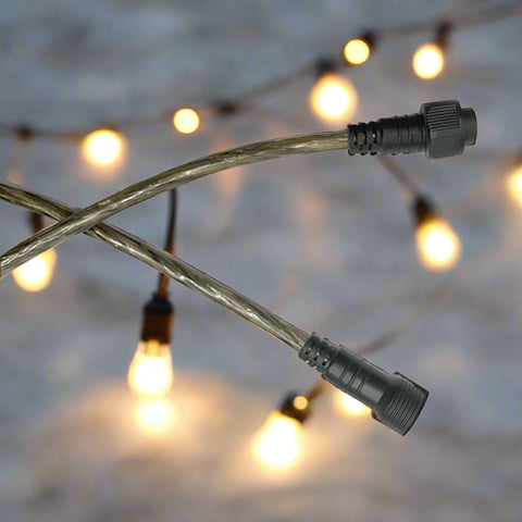 48 Ft S14 LED string lights installed at outdoor wedding
Close-up of S14 warm white LED bulb
Waterproof LED string lights cable
Full 48 ft patio string lights set with 15 bulbs
Outdoor café setting with LED string lighting
