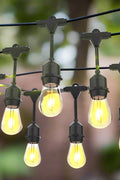 48 Ft S14 LED string lights installed at outdoor wedding
Close-up of S14 warm white LED bulb
Waterproof LED string lights cable
Full 48 ft patio string lights set with 15 bulbs
Outdoor café setting with LED string lighting