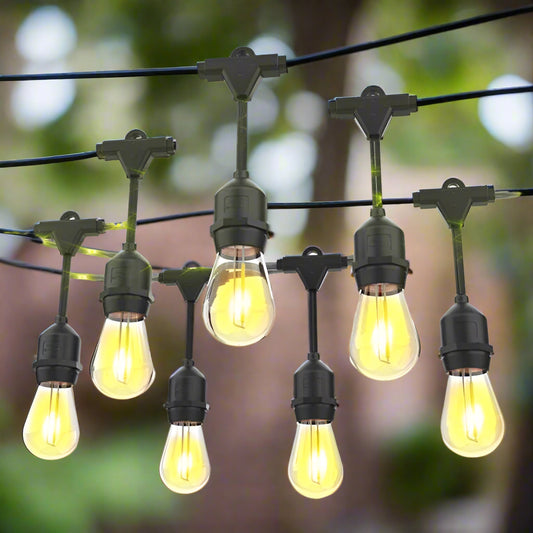 48 Ft S14 LED string lights installed at outdoor wedding
Close-up of S14 warm white LED bulb
Waterproof LED string lights cable
Full 48 ft patio string lights set with 15 bulbs
Outdoor café setting with LED string lighting