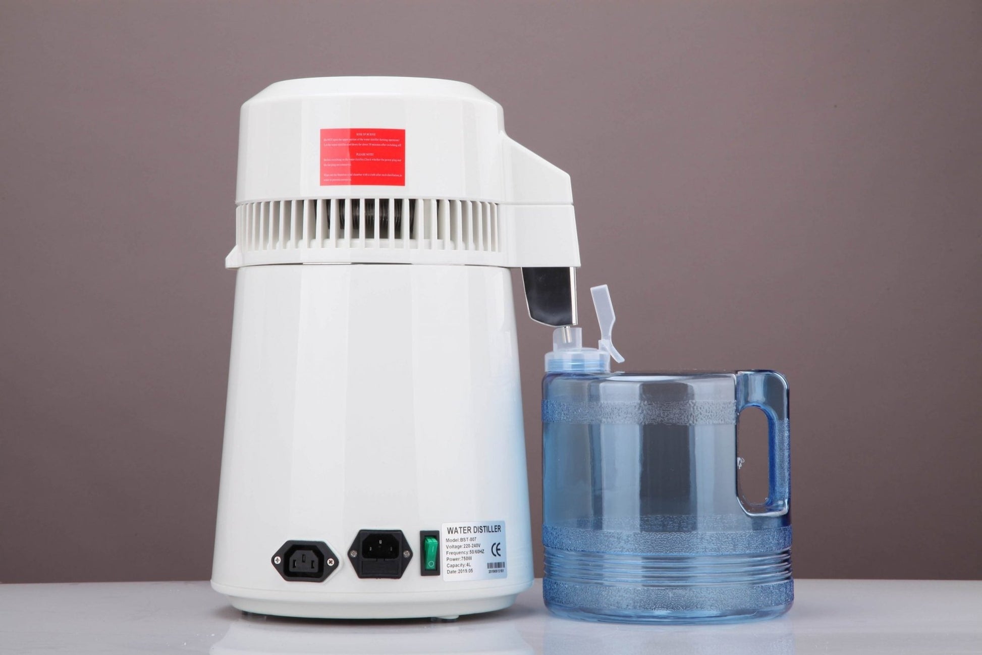 New 4L Countertop Water Distiller – 750W Stainless Steel Purifier for Home & Office Use S0615 - with | Sold by Uncle Wiener's Wholesale