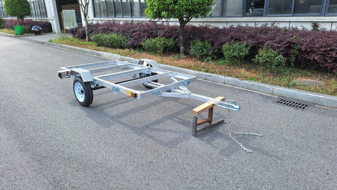 "4x8 folding aluminum utility trailer with built-in casters"

"Space-saving lightweight trailer for small vehicle hauling"

"Compact aluminum trailer folded vertically for storage"