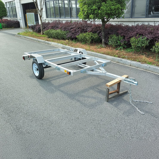 "4x8 folding aluminum utility trailer with built-in casters"

"Space-saving lightweight trailer for small vehicle hauling"

"Compact aluminum trailer folded vertically for storage"