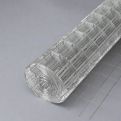 Roll of 5 FT x 100 FT welded wire fence with 4x4 inch mesh
Close-up of galvanized steel mesh with 4x4 square openings
Livestock fence roll laid out in field
Rust-resistant fencing roll with zinc finish
Heavy-duty wire fencing for garden or property use