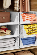 stackable folding closet storage bins 5 pack white

Closet organizer bins are used for clothing and shoes

foldable storage drawer stacked in a bedroom closet

white stackable plastic bins for home organization

Closet setup using folding stackable storage organizers