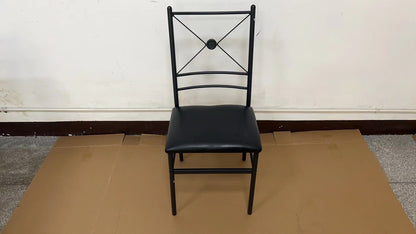 “Black metal dining table set with 4 chairs in modern kitchen”

“Compact 5-piece dining set with faux leather seats”

“Close-up of black chair with slatted back and cushioned seat”

“Space-saving dining table with wood grain finish”

“Modern 5-piece table and chair set for apartments”