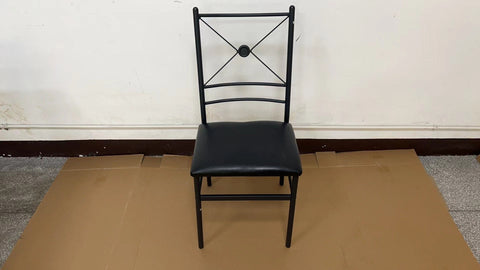 “Black metal dining table set with 4 chairs in modern kitchen”

“Compact 5-piece dining set with faux leather seats”

“Close-up of black chair with slatted back and cushioned seat”

“Space-saving dining table with wood grain finish”

“Modern 5-piece table and chair set for apartments”