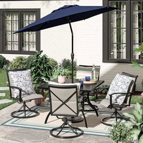 5-piece outdoor swivel dining set in garden setup

Black swivel dining chairs with cushions

Round glass-top patio dining table

Outdoor dining set with umbrella

Side view of black patio chairs and table