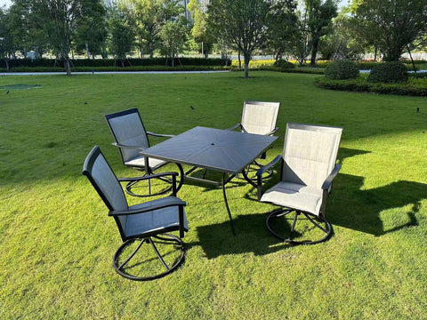 5-piece outdoor swivel dining set in garden setup

Black swivel dining chairs with cushions

Round glass-top patio dining table

Outdoor dining set with umbrella

Side view of black patio chairs and table