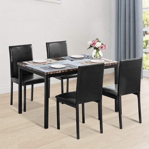 Black faux marble dining table with 4 black chairs
Side view of faux marble dining set in dining area
Chair detail showing faux leather upholstery
Compact 5-piece kitchen dining table set