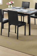 Black faux marble dining table with 4 black chairs
Side view of faux marble dining set in dining area
Chair detail showing faux leather upholstery
Compact 5-piece kitchen dining table set