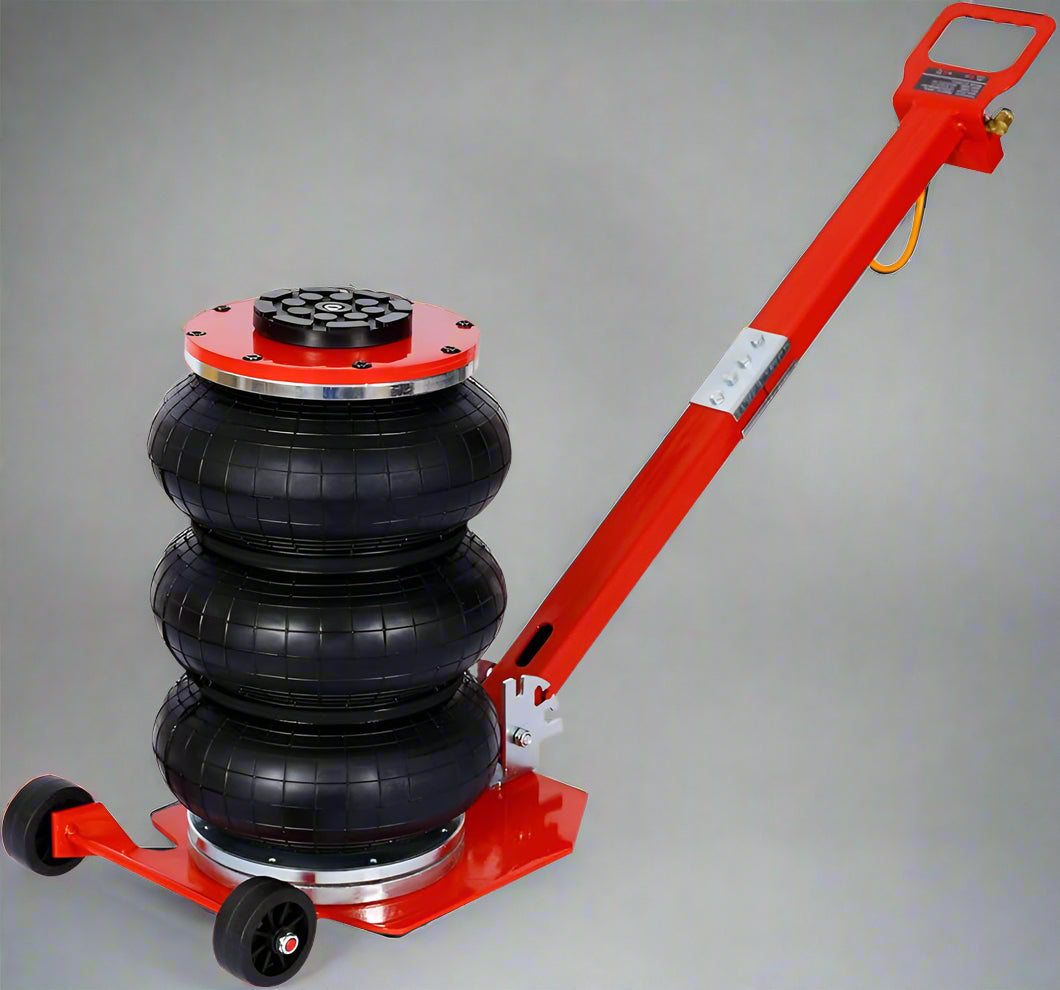 Triple Bag Pneumatic Air Jack – 5 Ton Capacity in Red and Black
5 Ton Air Jack – Top View Showing Triple Airbags and Base
Adjustable Handle Pneumatic Air Jack – Folded Position for Storage
Heavy-Duty Air Jack – Full Setup with Hose and Handle
Triple Air Bag Jack in Use – Lifting a Vehicle