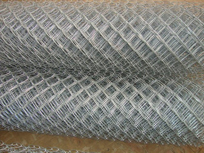Close-up of galvanized chain link fencing roll

Installed Class 1 chain link fence for residential use

11 gauge steel wire mesh fencing detail

Chain link fence with metal posts on concrete

Heavy-duty galvanized fence roll packaging