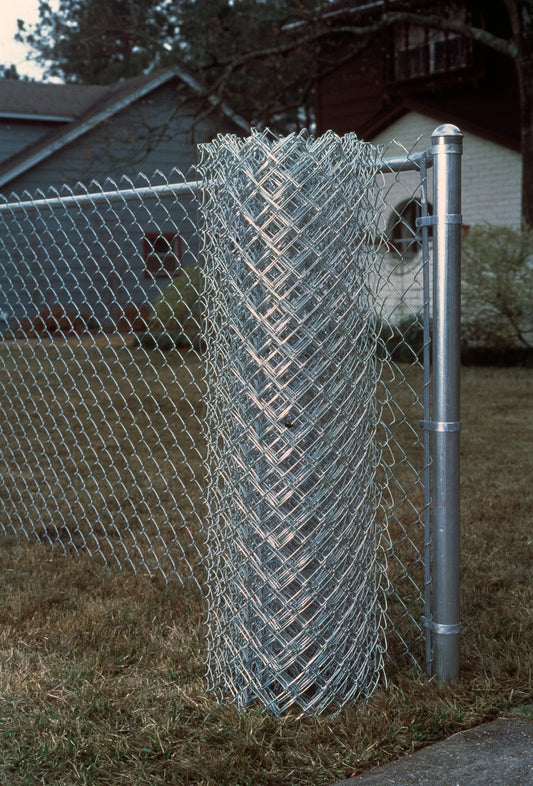 Close-up of galvanized chain link fencing roll

Installed Class 1 chain link fence for residential use

11 gauge steel wire mesh fencing detail

Chain link fence with metal posts on concrete

Heavy-duty galvanized fence roll packaging