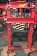 Close-up of dual hydraulic pump controls on 50 ton press