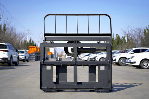 Side view of 5000 lb side shift pallet forks for skid steer

Heavy-duty hydraulic pallet fork with side shift mechanism

Pallet fork attachment mounted on forklift outdoors

Black steel frame skid steer pallet forks with side shift

Industrial pallet forks for warehouse and yard use