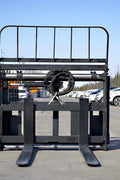 Side view of 5000 lb side shift pallet forks for skid steer

Heavy-duty hydraulic pallet fork with side shift mechanism

Pallet fork attachment mounted on forklift outdoors

Black steel frame skid steer pallet forks with side shift

Industrial pallet forks for warehouse and yard use