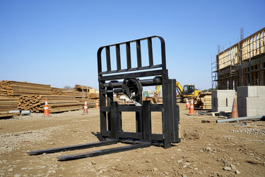 Side view of 5000 lb side shift pallet forks for skid steer

Heavy-duty hydraulic pallet fork with side shift mechanism

Pallet fork attachment mounted on forklift outdoors

Black steel frame skid steer pallet forks with side shift

Industrial pallet forks for warehouse and yard use
