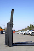 Side view of 5000 lb side shift pallet forks for skid steer

Heavy-duty hydraulic pallet fork with side shift mechanism

Pallet fork attachment mounted on forklift outdoors

Black steel frame skid steer pallet forks with side shift

Industrial pallet forks for warehouse and yard use