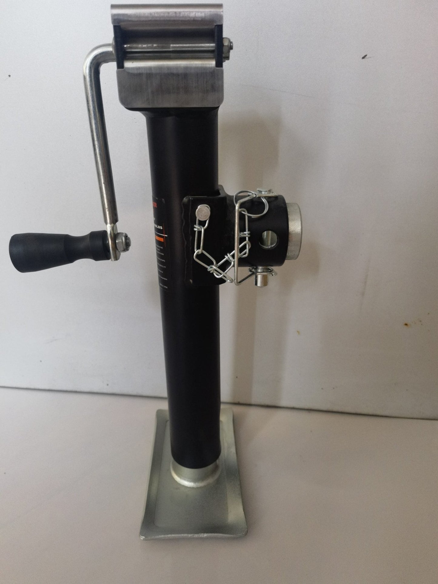 “Heavy-duty 5000 lb side wind trailer jack with 10 inch lift”

“Black implement jack TJ5000H for farm trailers and towing”

“Mountable mechanical trailer jack with smooth crank handle”