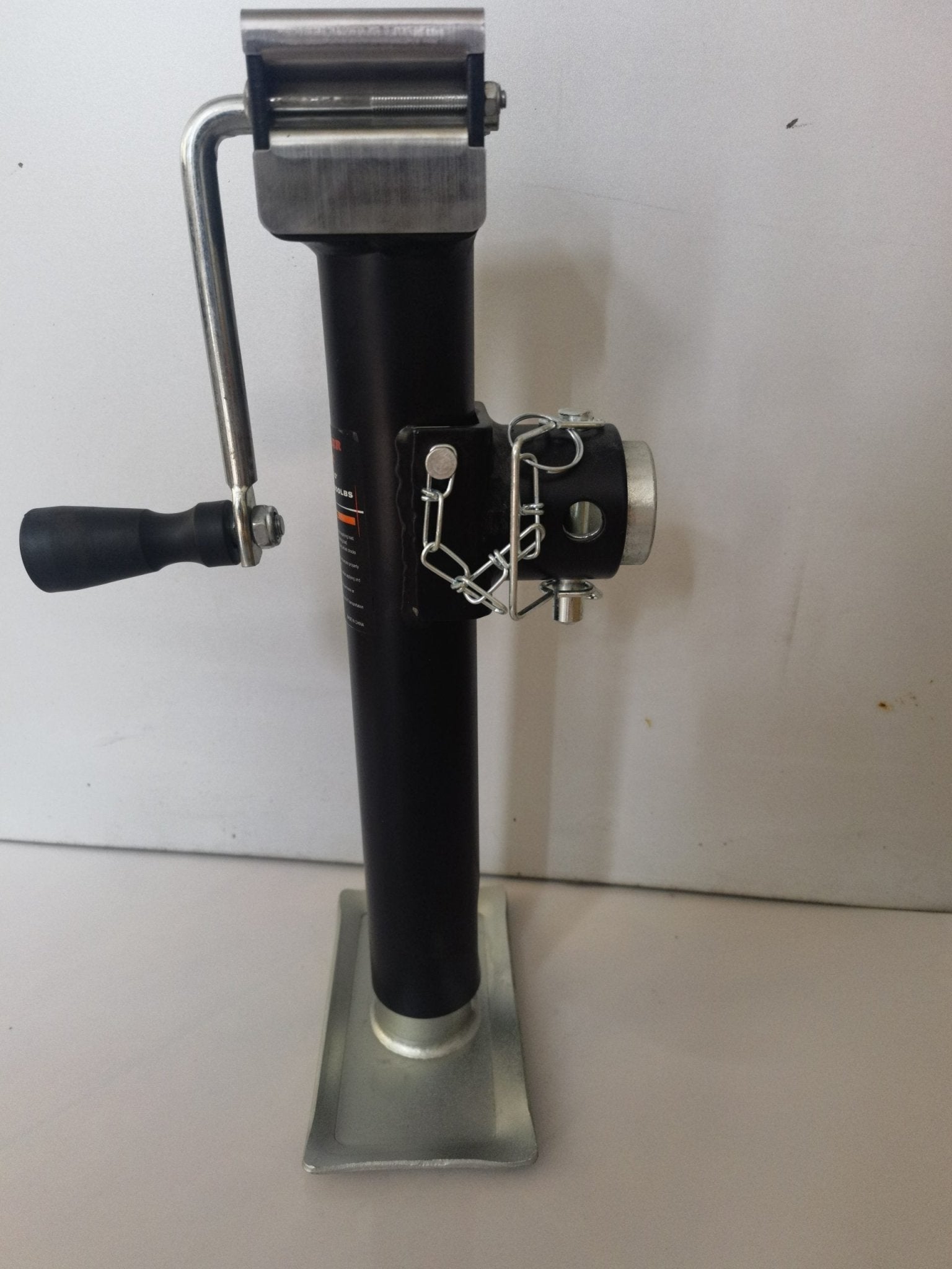 “Heavy-duty 5000 lb side wind trailer jack with 10 inch lift”

“Black implement jack TJ5000H for farm trailers and towing”

“Mountable mechanical trailer jack with smooth crank handle”