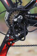 500W electric mountain bike with 26 inch wheels and disc brakes
Rear hub motor and 48V battery mounted on aluminum frame
Side view of electric mountain bike with front suspension
Handlebar and display panel of 21-speed electric bike
29 inch aluminum electric bike with 48V lithium battery